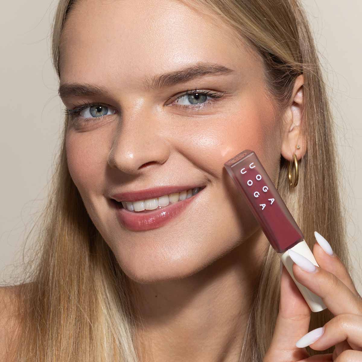 Uoga uoga Lūpu spīdums